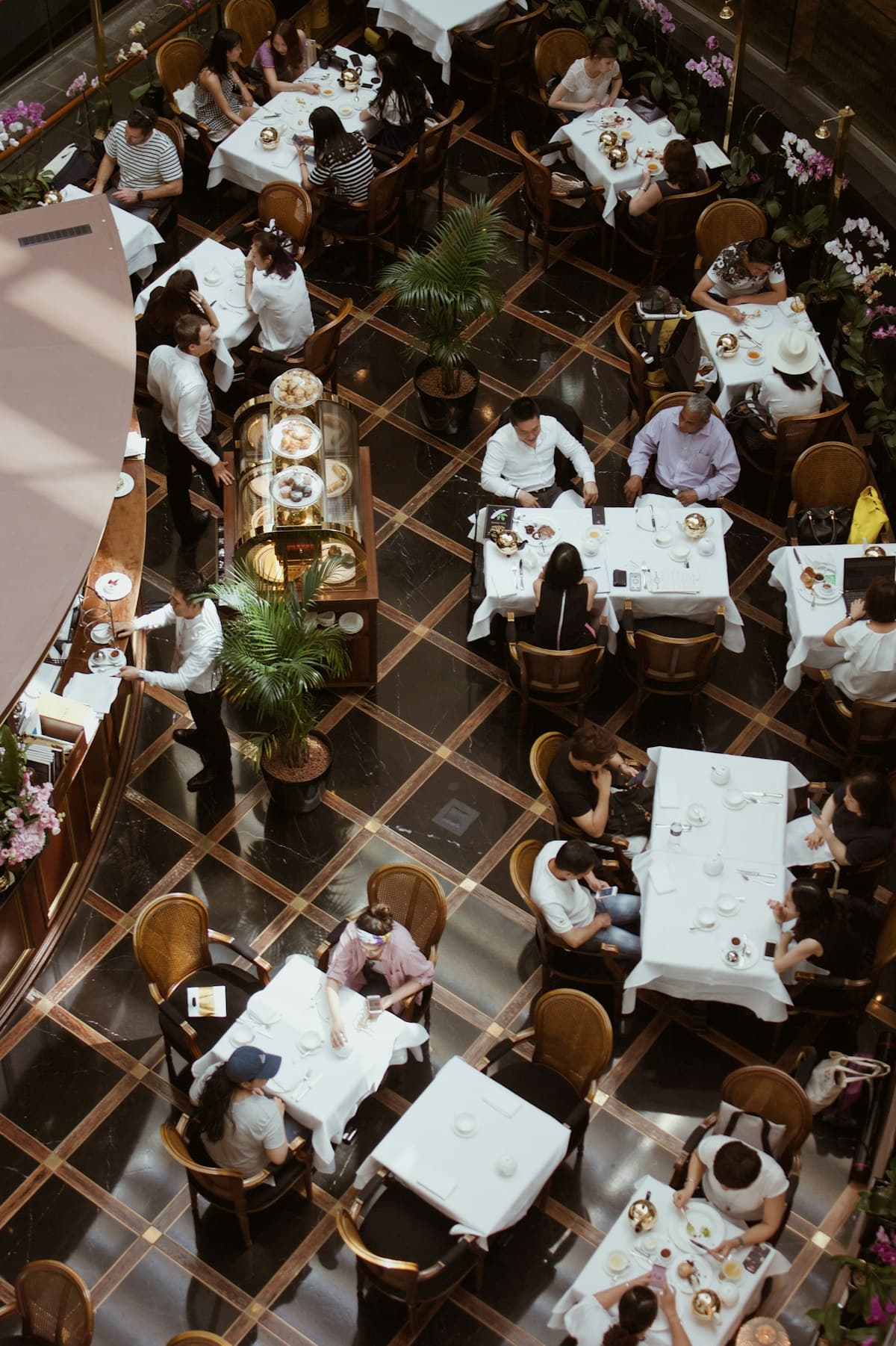 Candlelit dinner table at an intimate restaurant in Mexico City with warm ambient lighting
