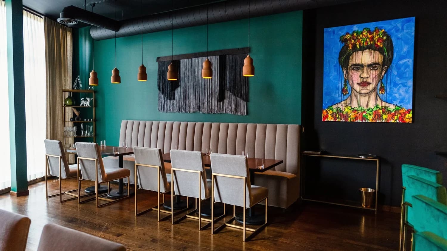A plated dish at Cariño in Chicago with refined presentation and warm dining-room light