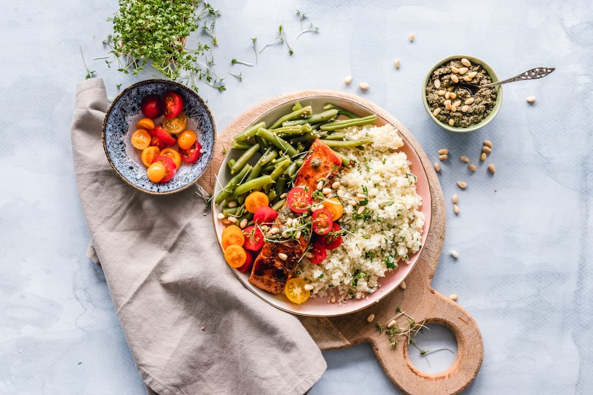 A table of colorful Mediterranean dishes prepared for sharing