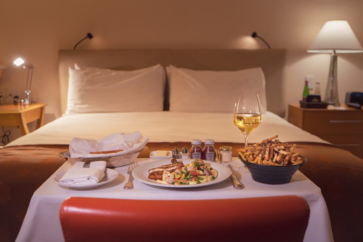 Elegant plated dish with wine glass at a San Francisco fine dining restaurant